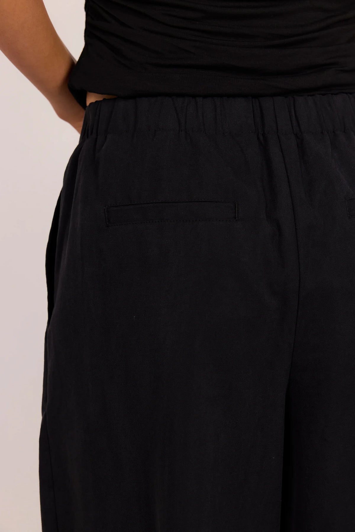 Manifesto Black Front Pleat Barrel Leg Pants | Stories Be Told