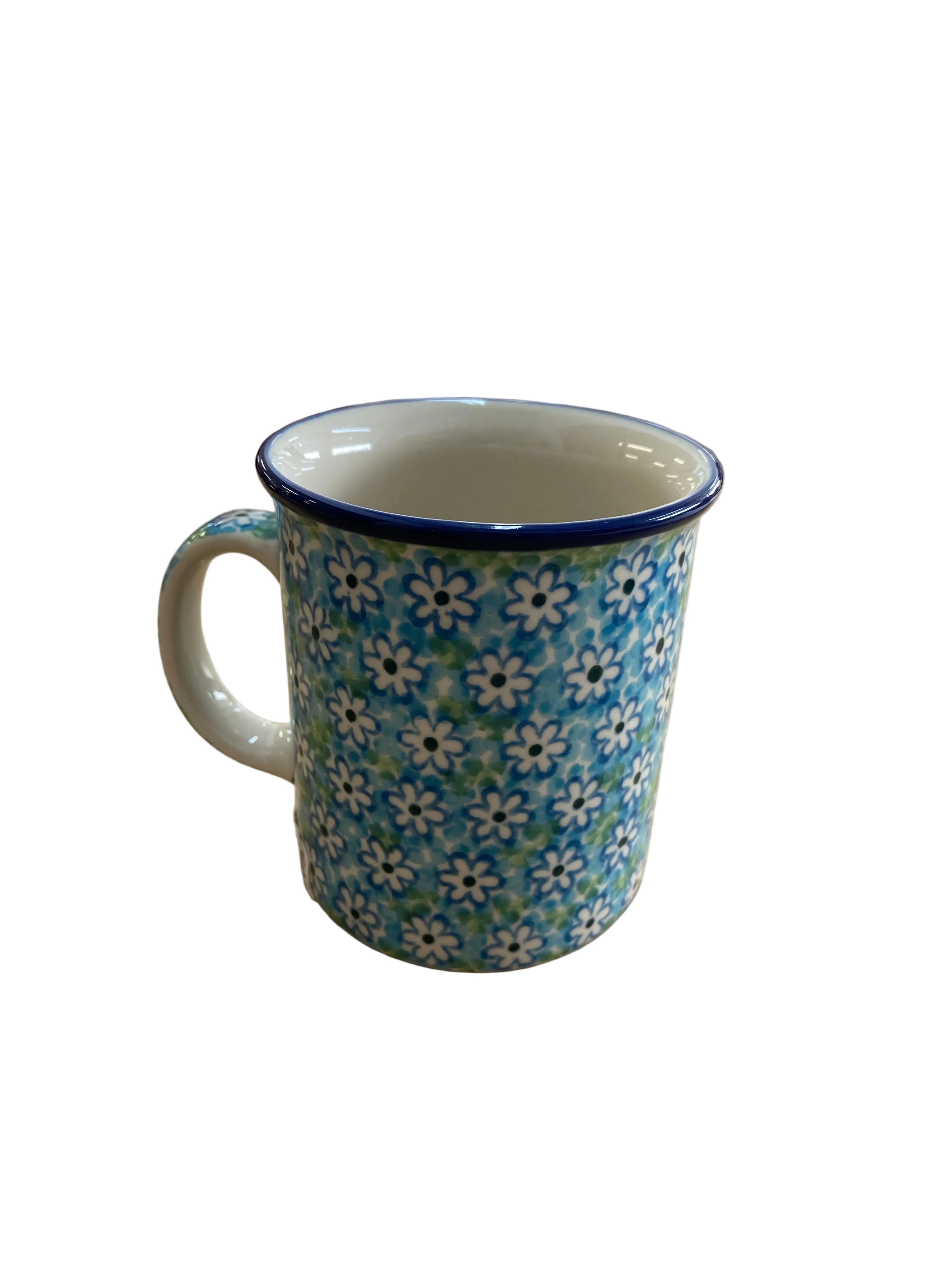  ceramic mug with a blue and white floral pattern and a dark blue rim.
