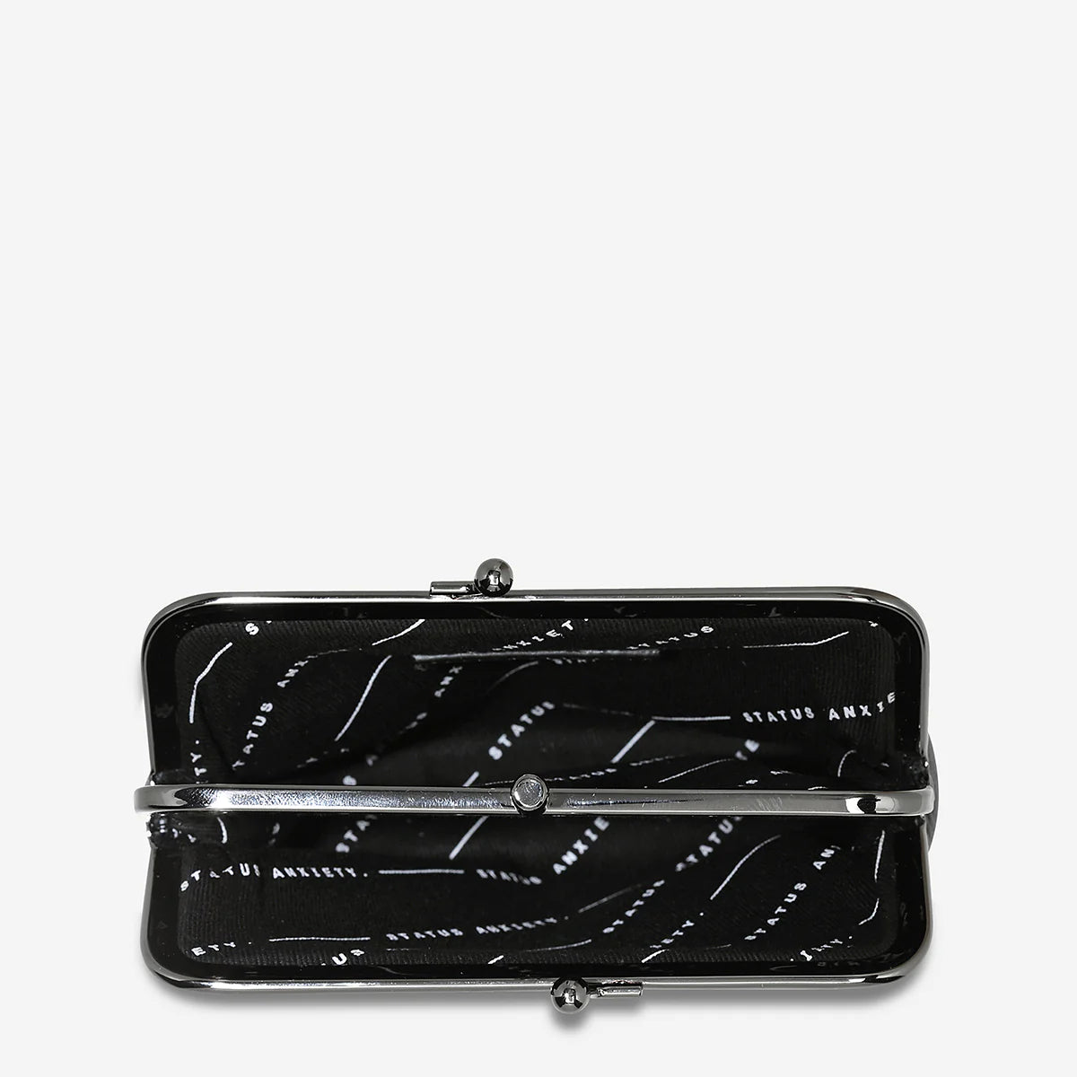 Volatile | Black | Status Anxiety